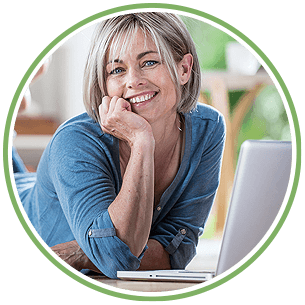 Woman at laptop on table